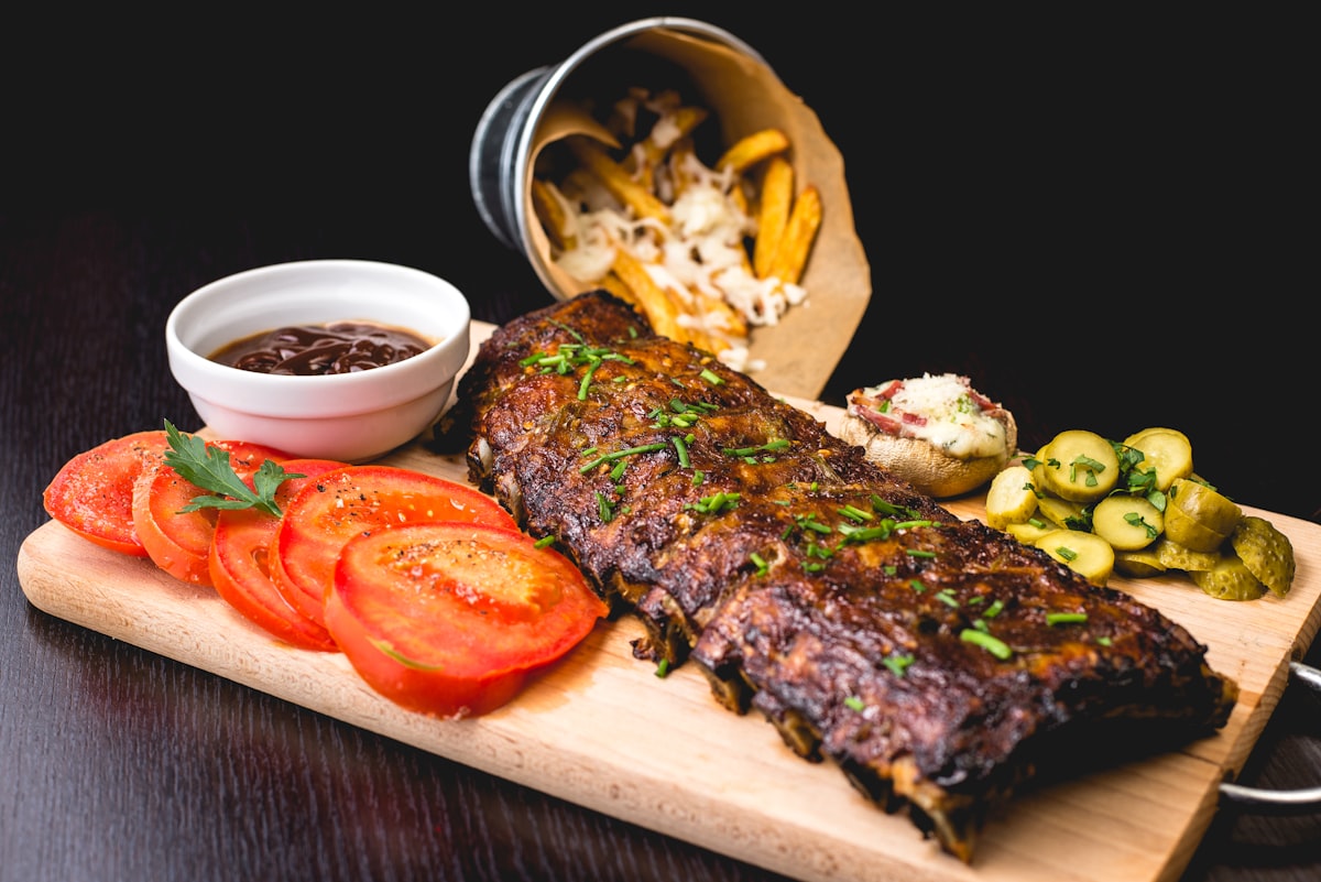 Plated steak dish with seasonal garnish